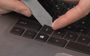 How to clean a laptop keyboard - pry off the keys